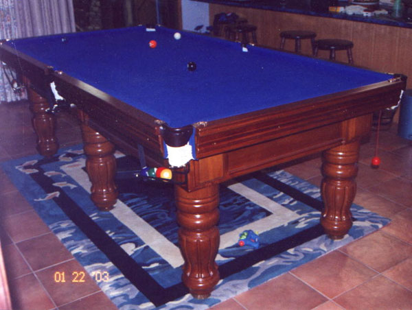 Royal Deluxe billiard table with turned scrolled legs and moulded leg panels